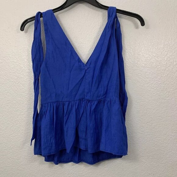 The Impeccable Pig Sleeveless Tie Shoulder Peplum Top - Picture 5 of 10